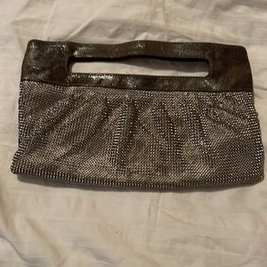 BCBG Maxazria silver clutch purse.